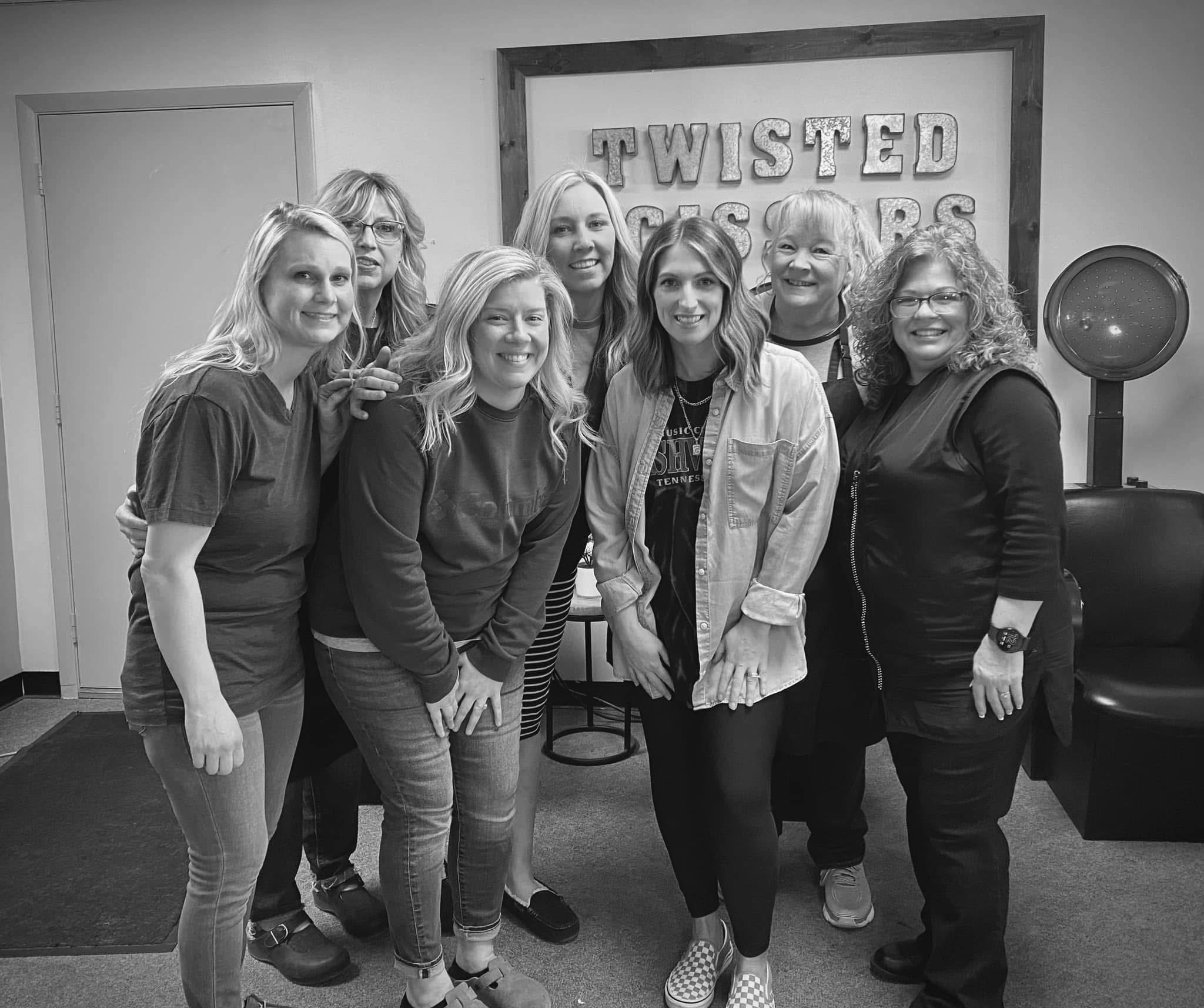 The stylists of Twisted Scissors together in the salon