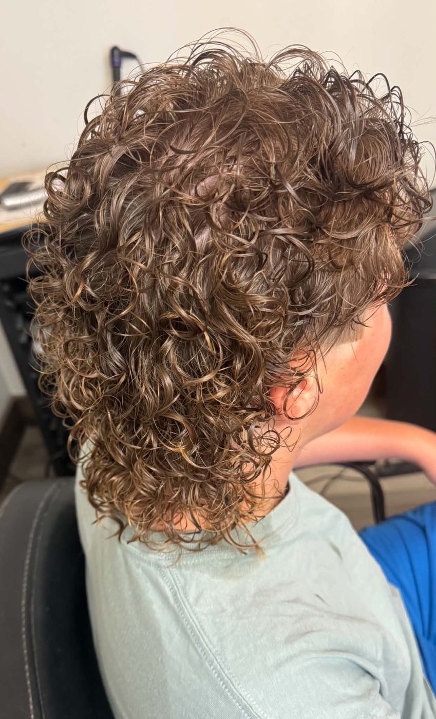 Hair color and styling by the Twisted Scissors team