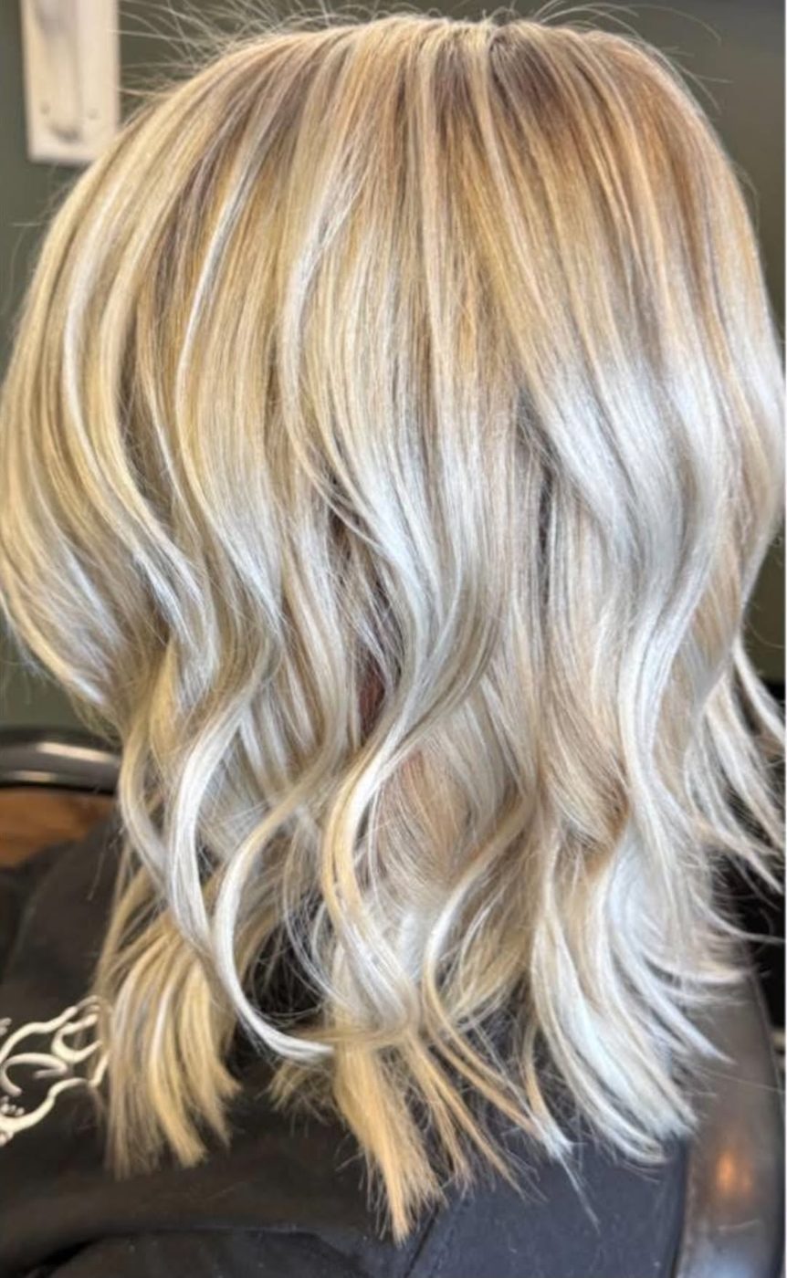 Hair color and styling by the Twisted Scissors team